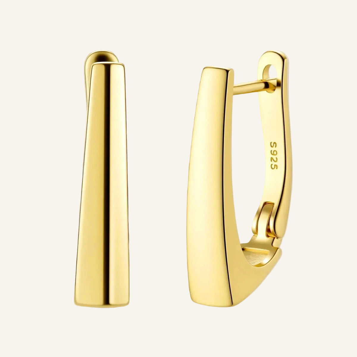 Sleek 14K gold-plated sterling silver huggie earrings with polished finish and geometric elongated design on white background.
