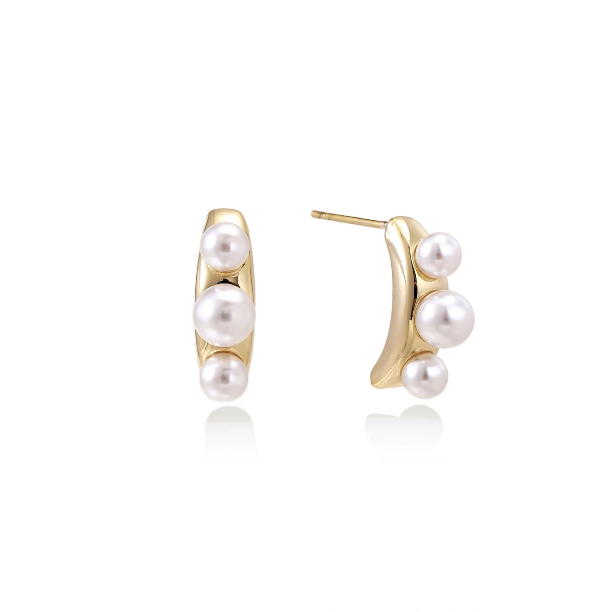 14K gold-plated curved stud earrings with three white freshwater pearls aligned vertically on cream background