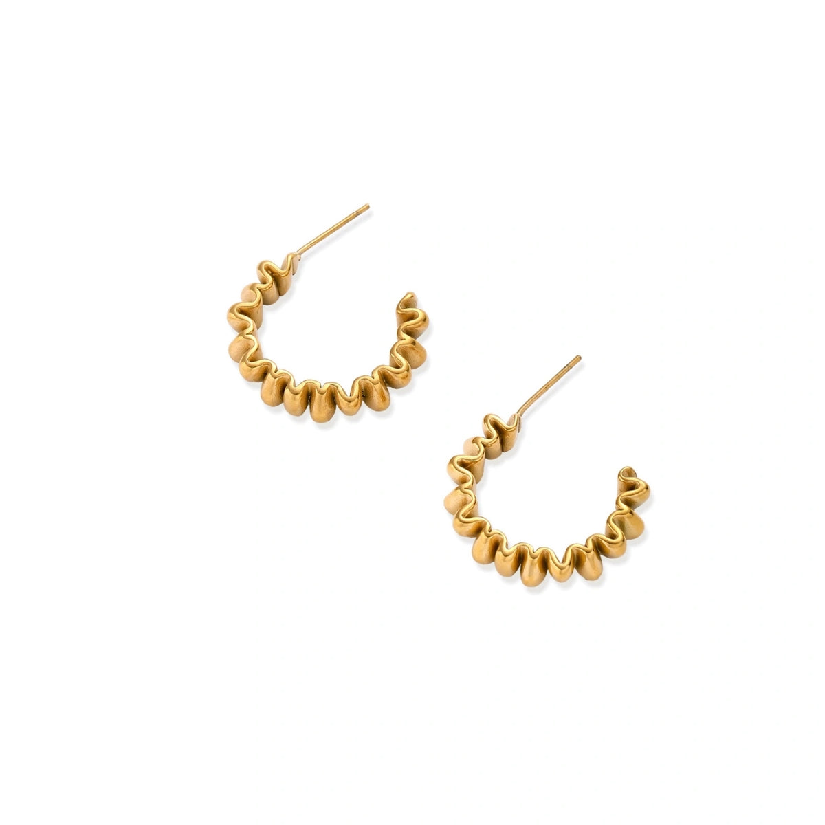 Sculptural gold-plated hoop earrings with continuous twisted spiral design on cream background