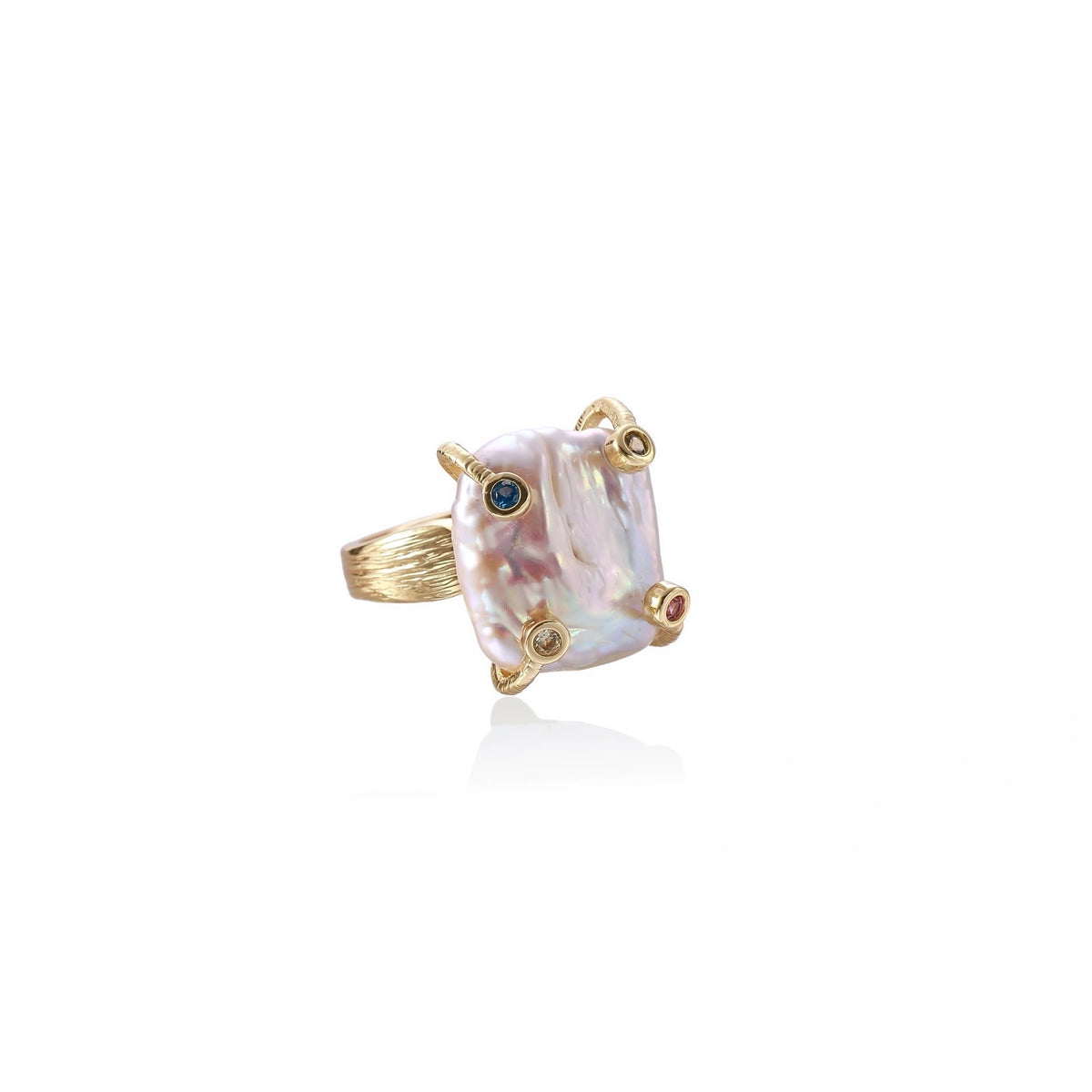 Gold ring with large iridescent baroque pearl and four colored gemstones on textured band